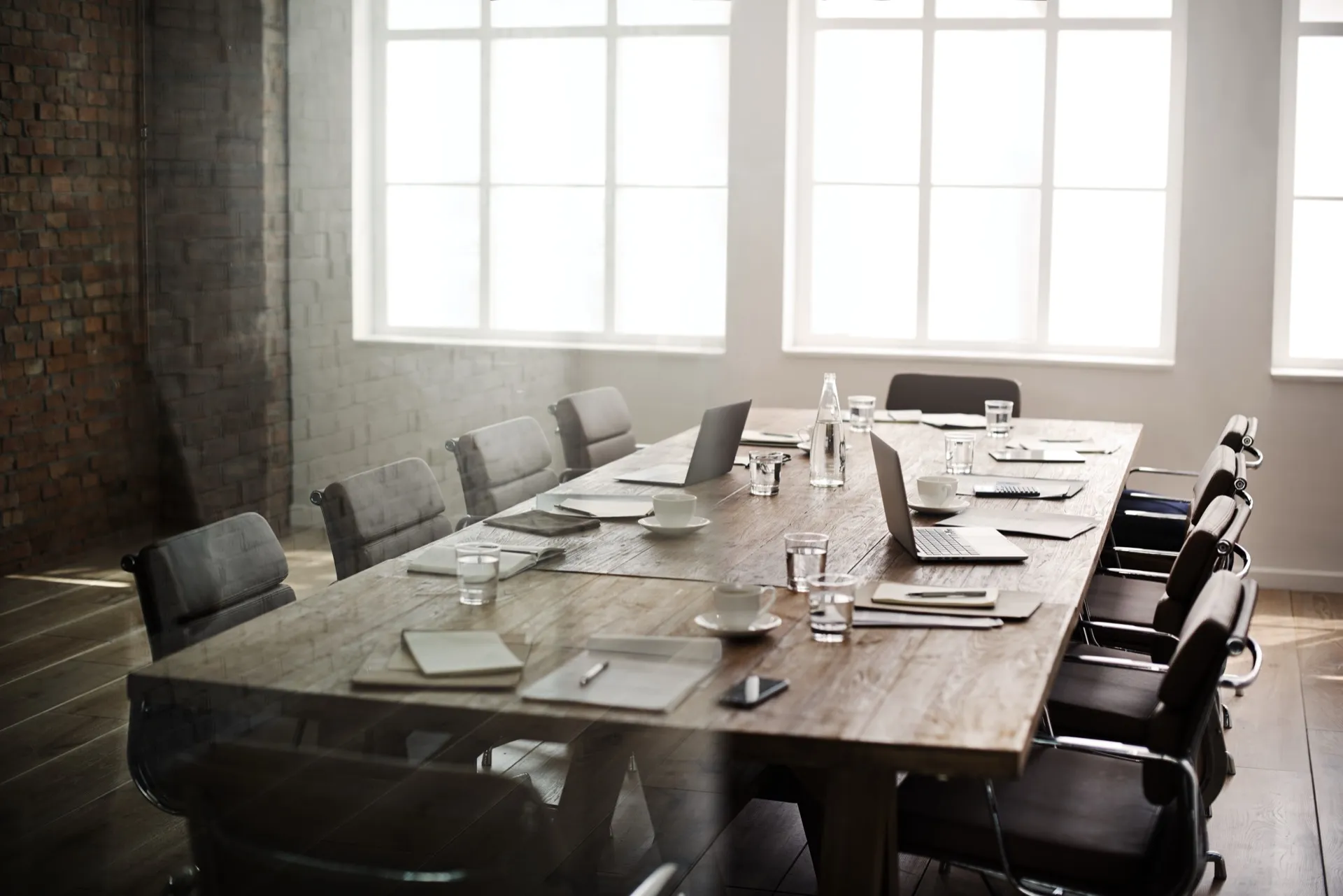 Professional meeting room with wireless technology for executive conversations