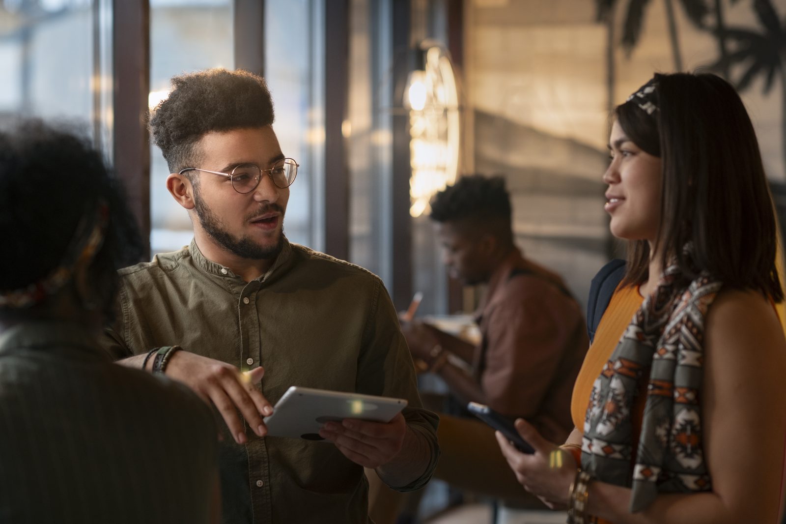 Founders and operators networking at a lounge during a tech event