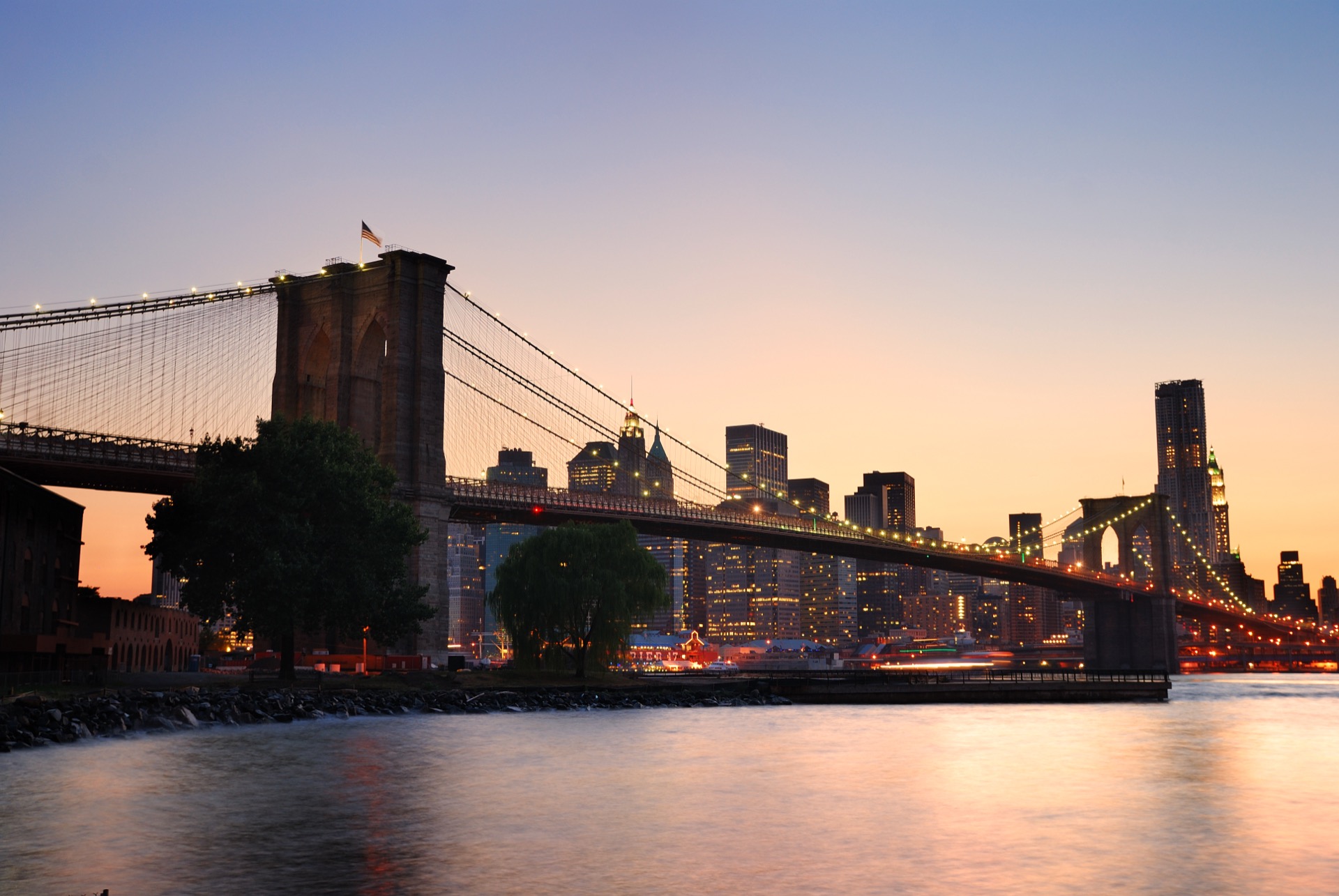 Brooklyn Bridge connecting Manhattan to Brooklyn, symbolizing the distributed workforce across NYC boroughs