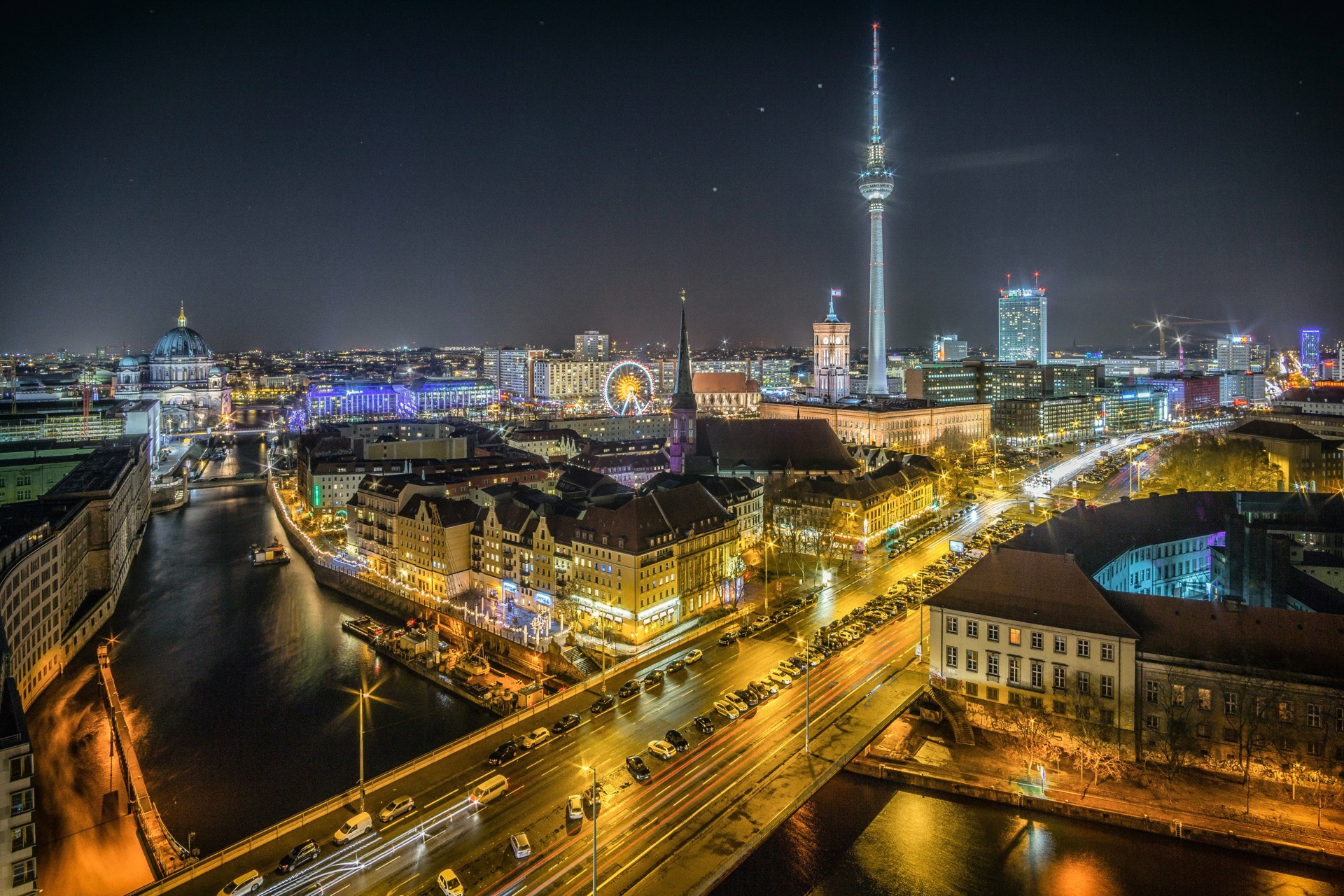 Berlin at night with illuminated streets and urban atmosphere