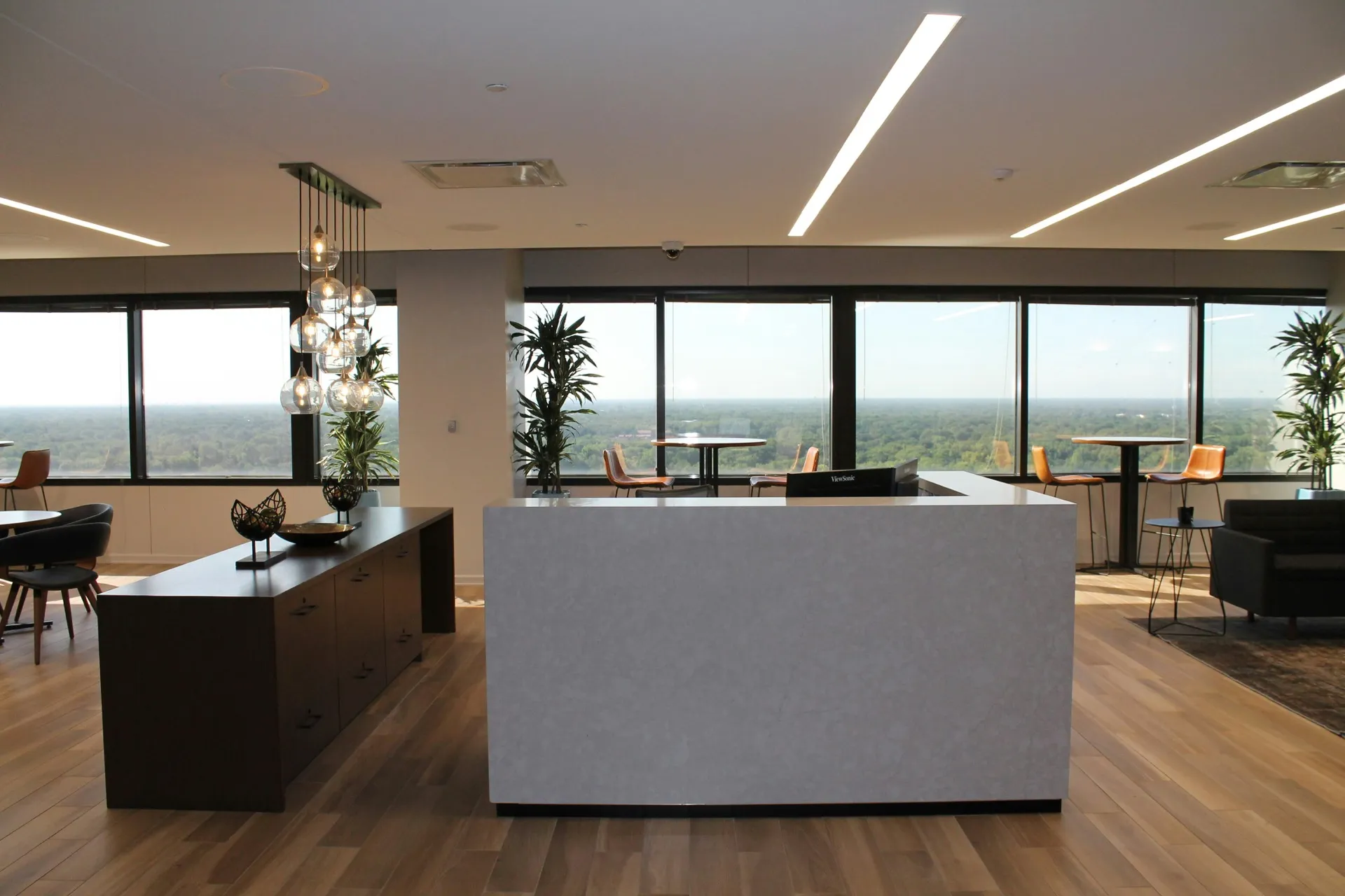 Modern hybrid workspace showing the divide between visible and remote employees