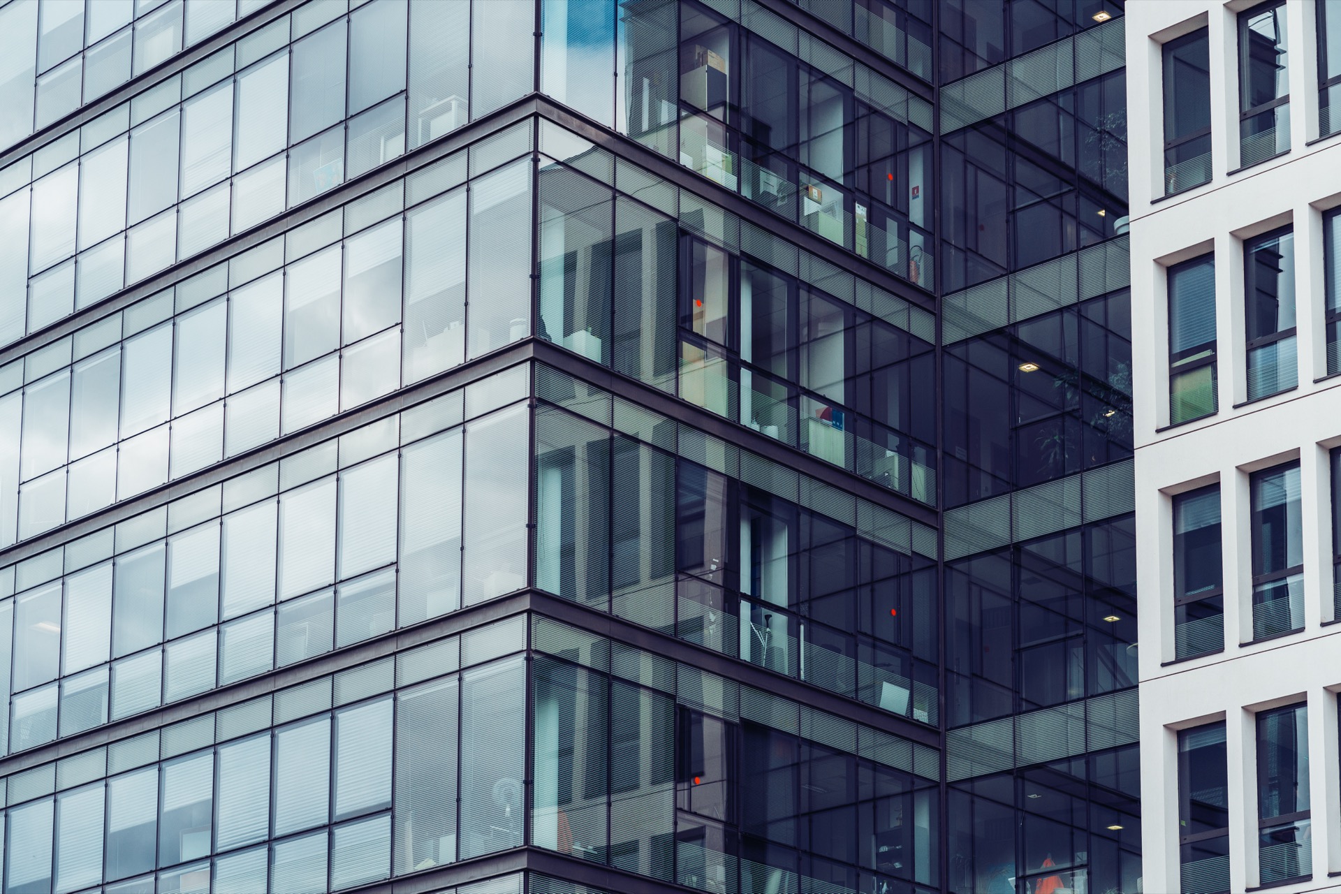 Modern office building facade representing fixed office infrastructure