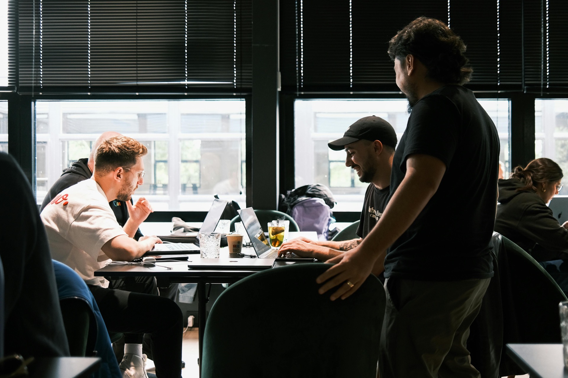 A team collaborating in a bright coworking environment