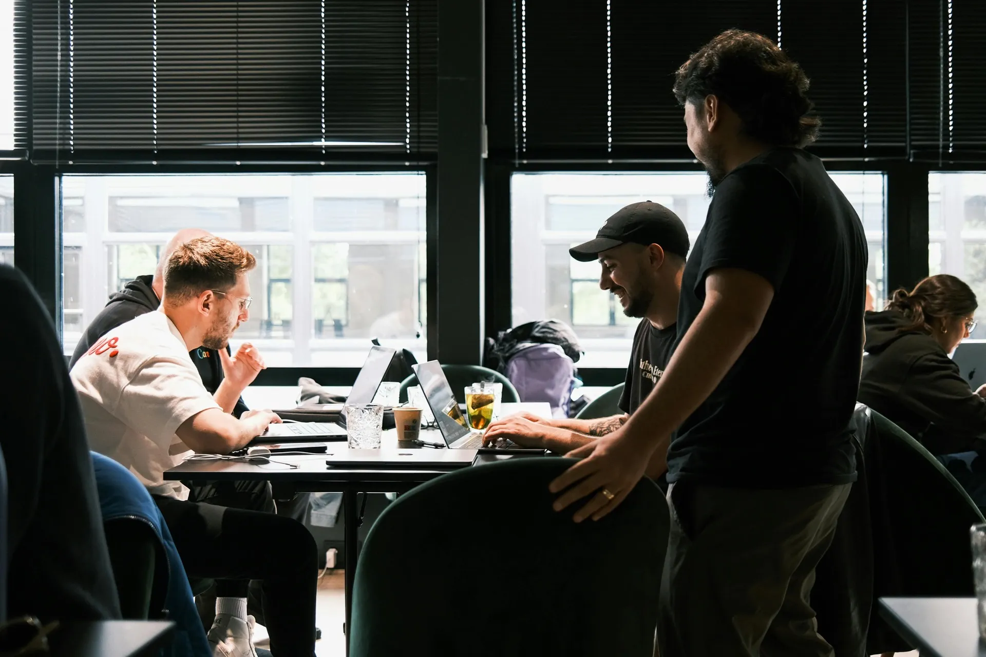 A team collaborating in a bright coworking environment