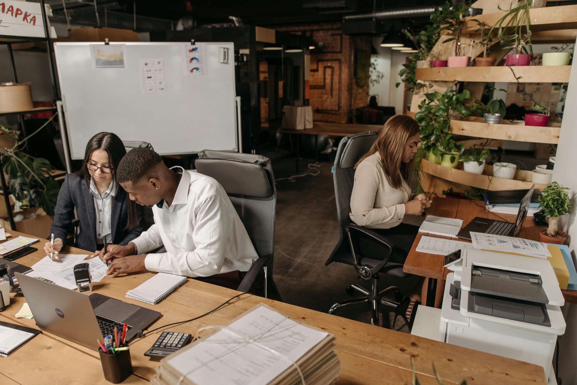 Distributed team working together in a coworking space