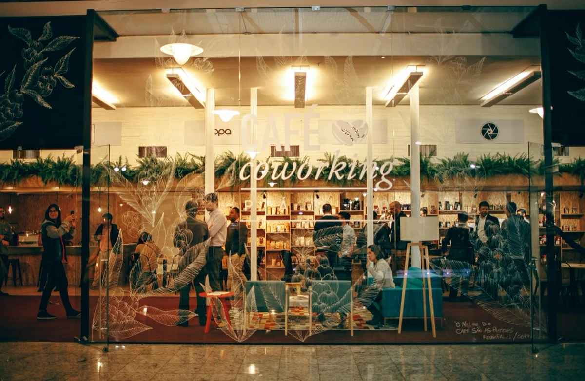 Welcoming cafe storefront representing the third space concept