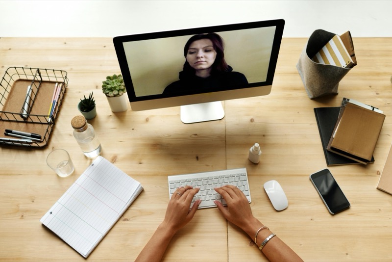 Modern hybrid workplace with video conferencing technology