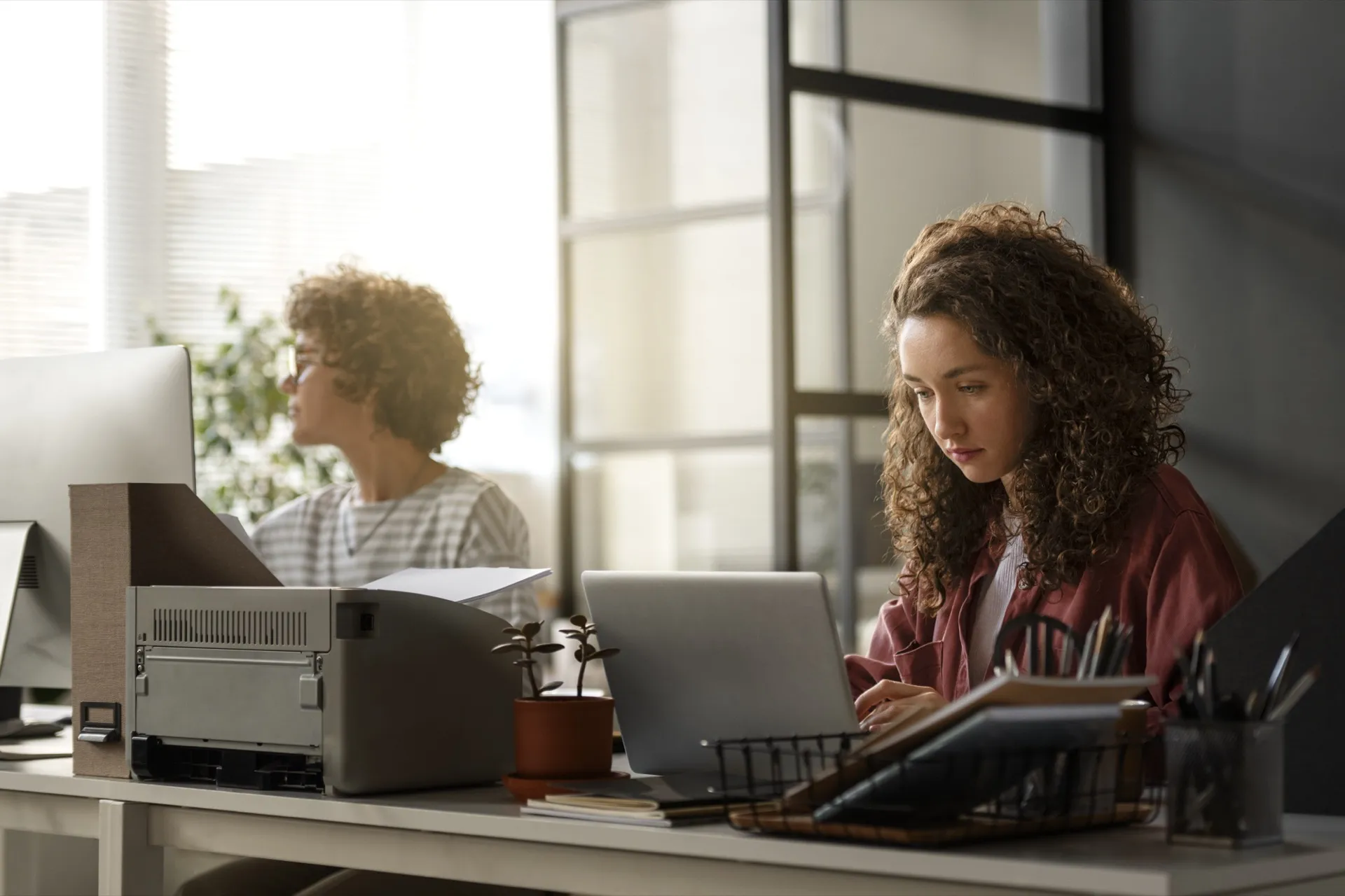 Team collaborating in a modern hybrid workspace