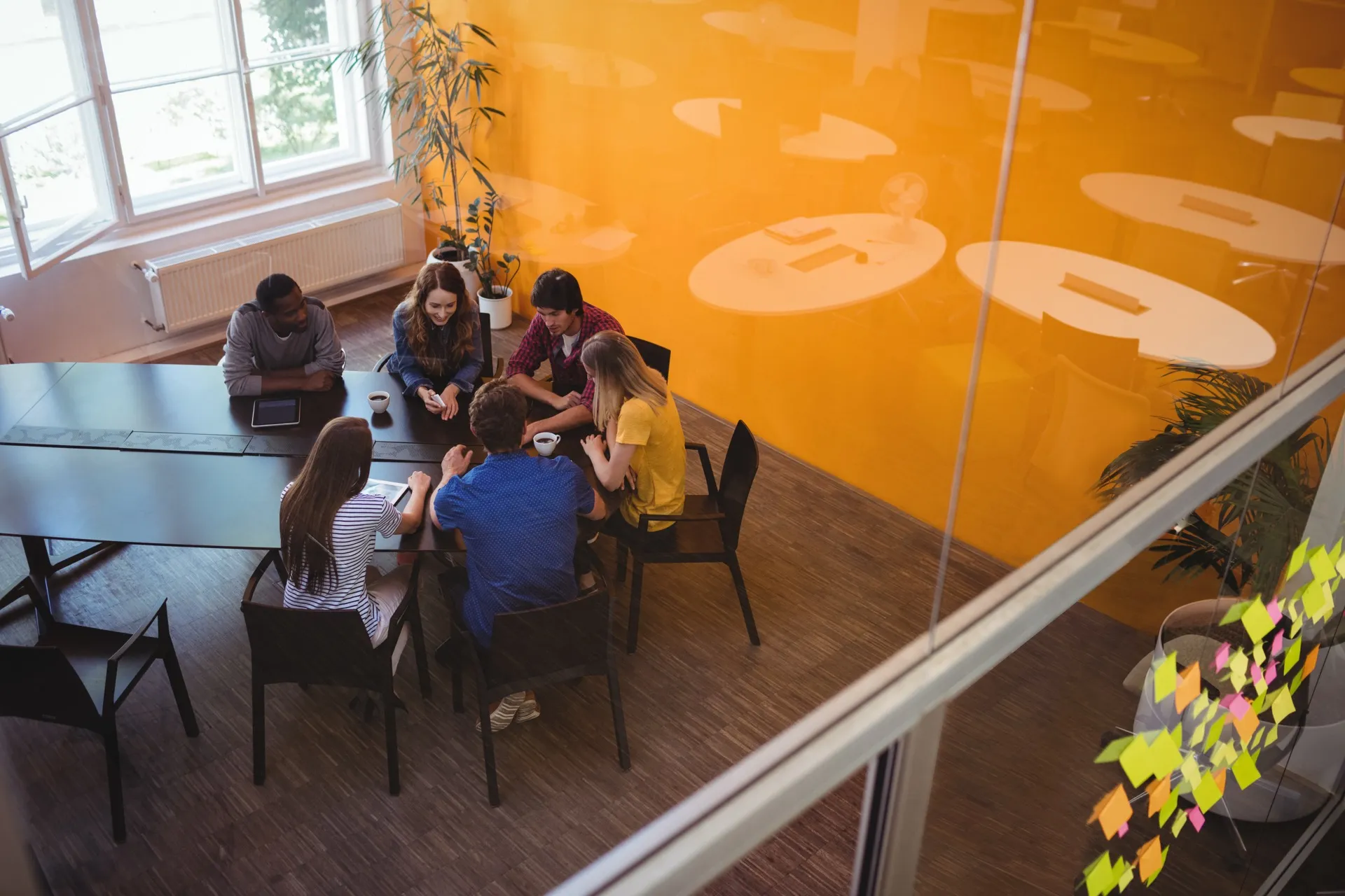 Business executives discussing hybrid work strategy
